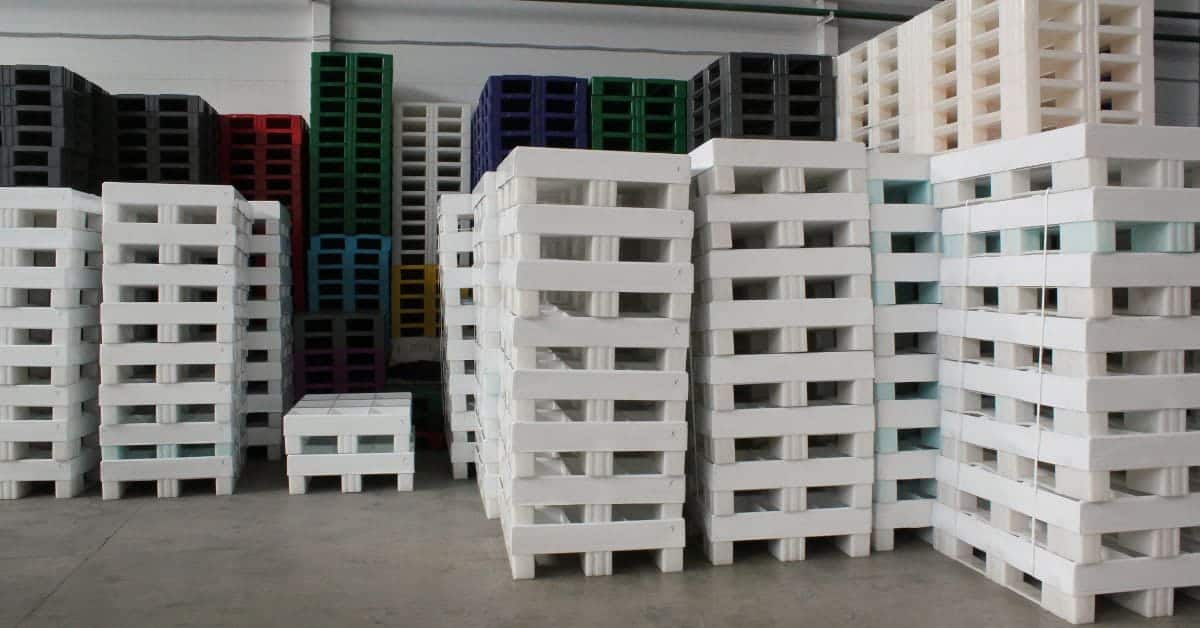 a pile of plastic pallets